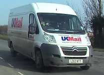 ukmail-driver-texting.png