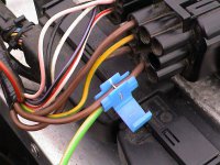 Using Scotchlok instead of splicing when connecting to existing wires in a car.