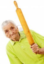 11913942-angry-old-woman-holding-a-rolling-pin-in-her-hand.jpg