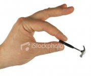 istockphoto_5468342-hand-holding-small-hammer.jpg
