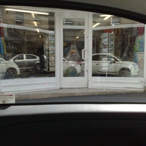 checking out the car in shop windows!