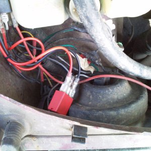 Offside inner wing/headlight under bonnet