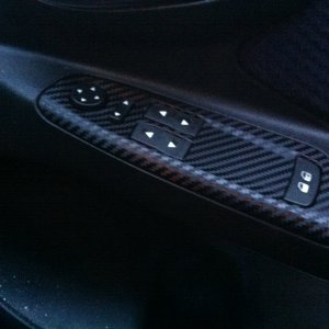 Carbon wrapped window controls